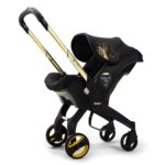 Doona Car Seat Limited Edition inc FREE SEAT PROTECTOR - Gold